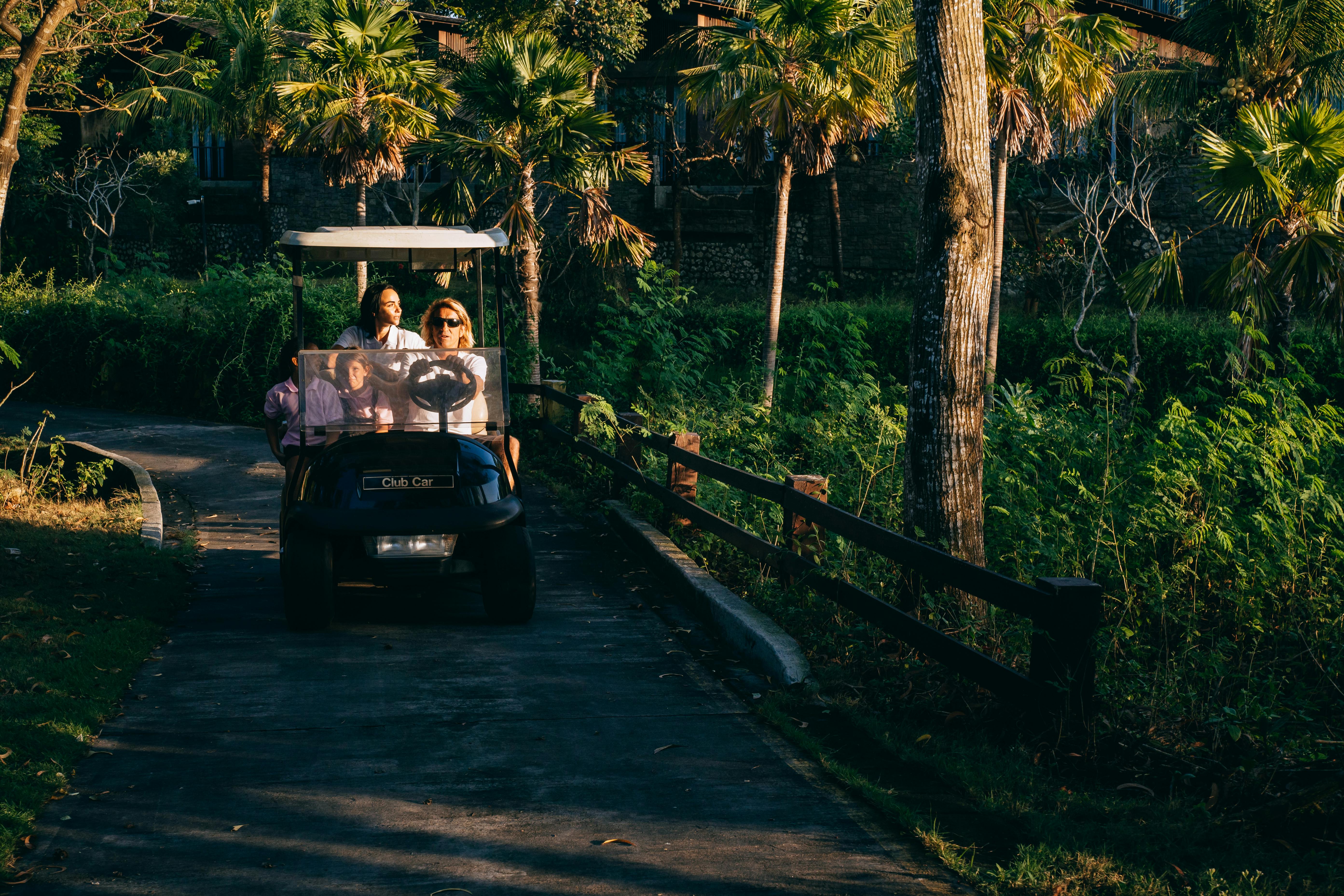 Customers enjoying a golf cart rental